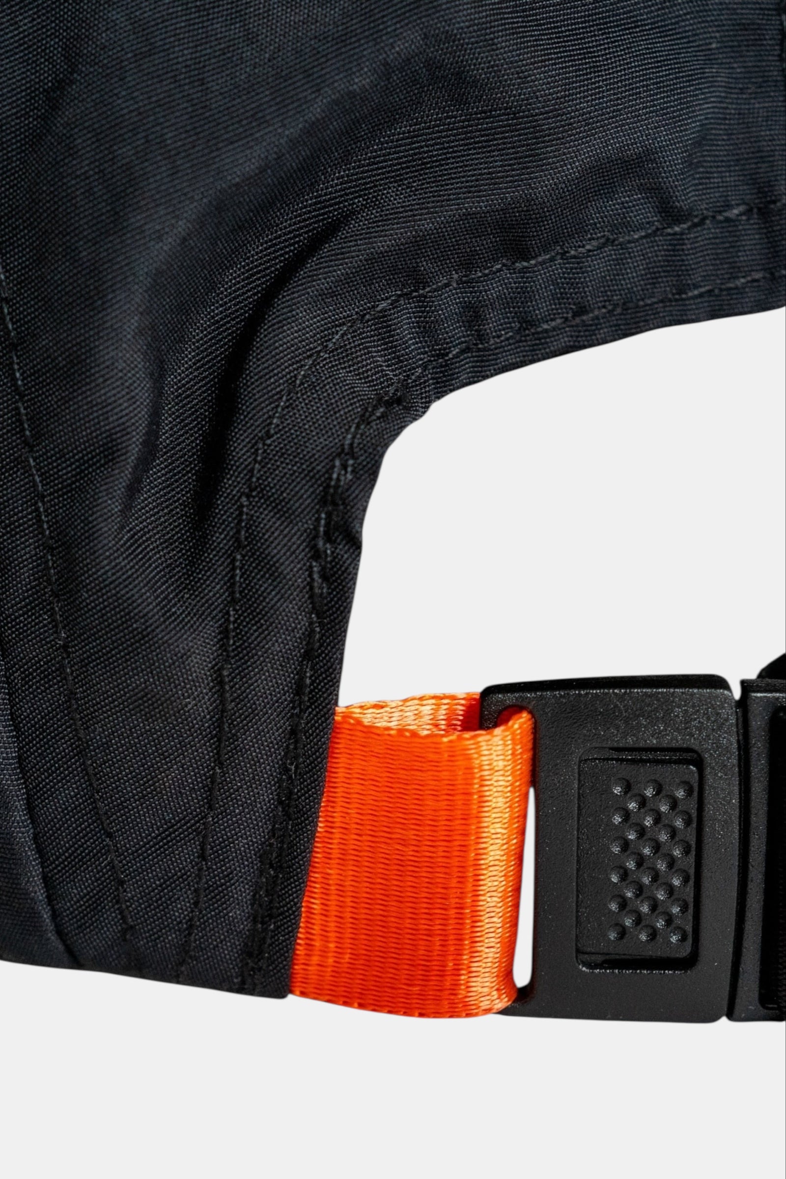 Fifth Digit Runner structured cap in black, strap and orange tab detail